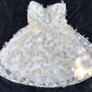 White and gold, floral appliqué cocktail dress.